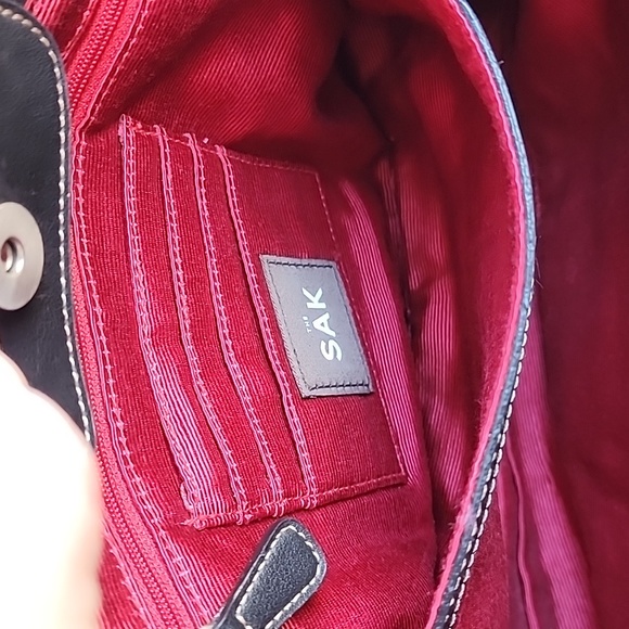 The Sak black clutch purse with metal handle bars - Picture 10 of 12